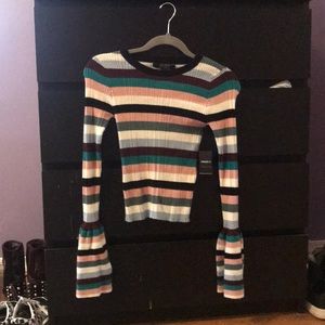 Striped, bell sleeved sweater.